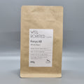 A 200g bag of Well Roasted Coffee Kenya AB whole bean in a brown kraft paper pouch with a white label, set against a neutral grey background.