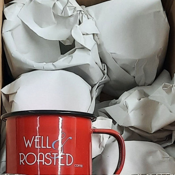 Well Roasted Coffee red branded coffee mug