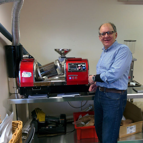 William Scott, owner and roaster pictured with his coffee roaster