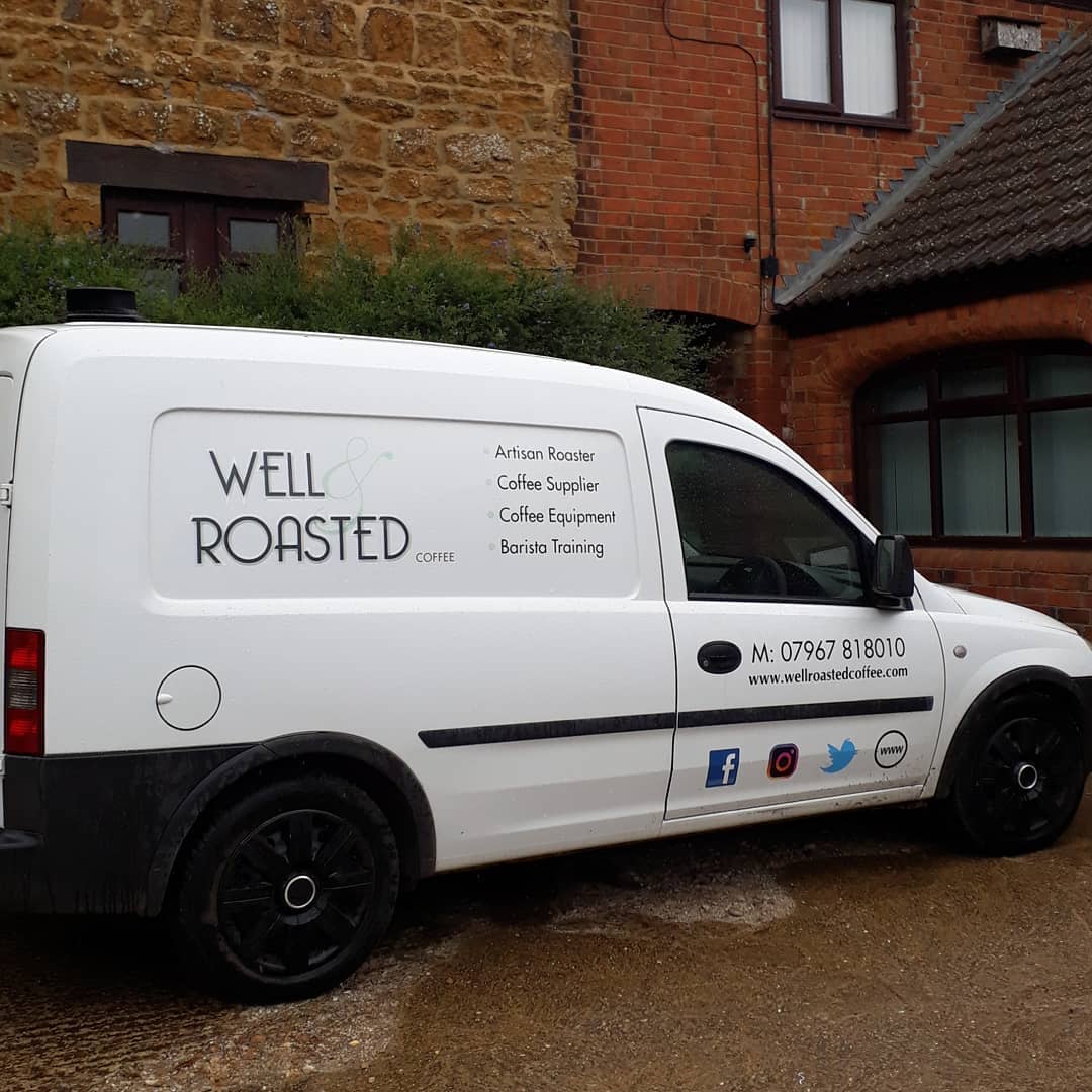 Well Roasted Coffee branded delivery van parked at our roastery
